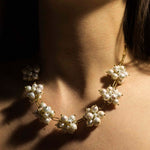 Necklace with cultured pearls