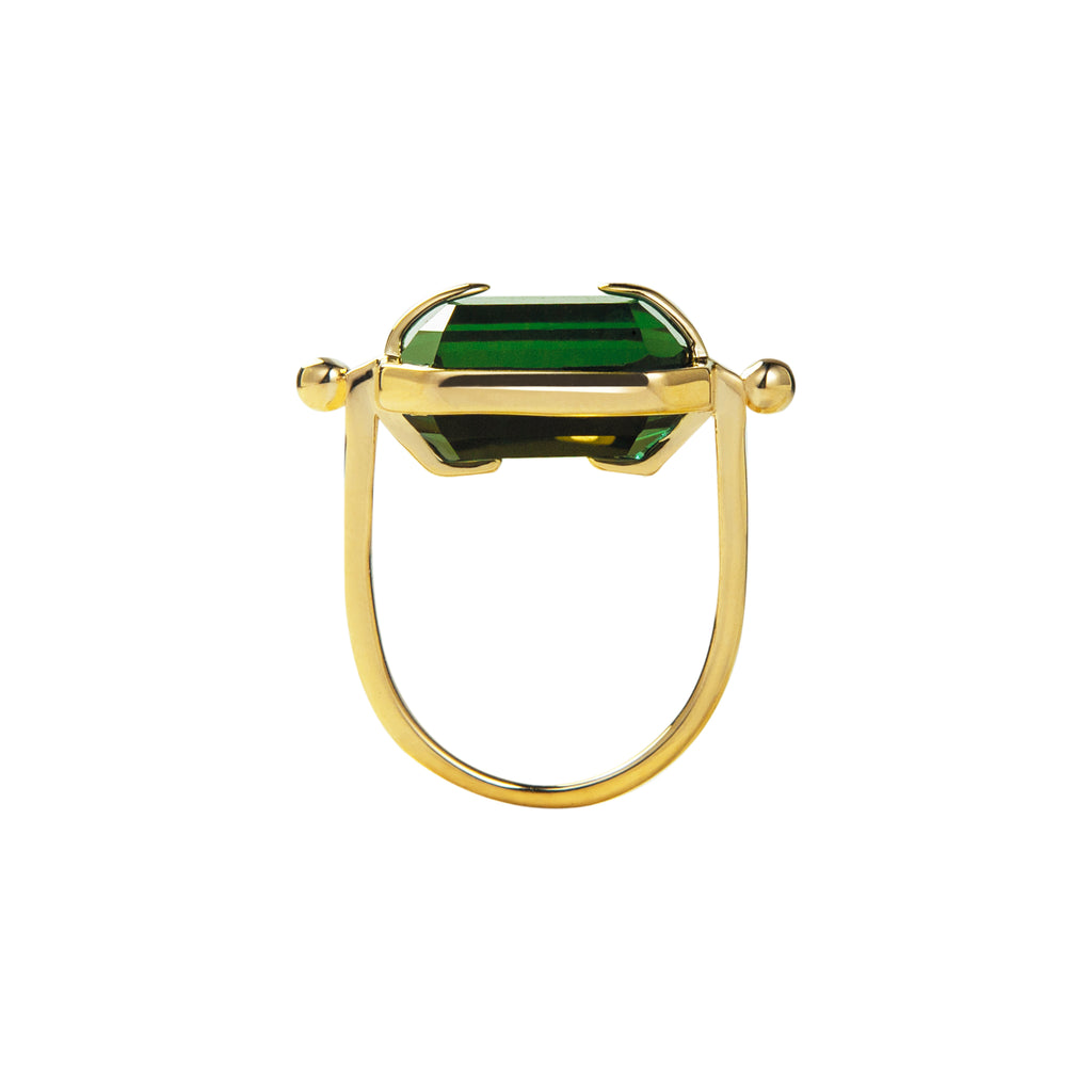 Ring with a green crystal