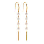 Earrings with natural pearls