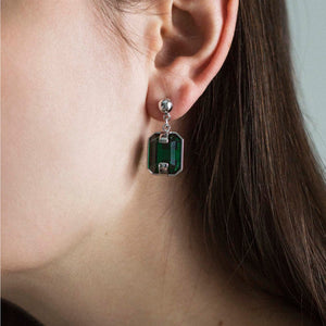 Earrings with green crystals
