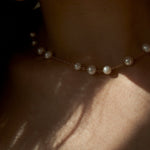 Necklace with cultured pearls
