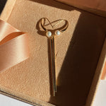 Earrings with cultured pearls